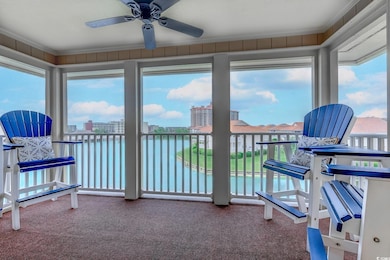 Sunroom with a water view and a wealth of natural light