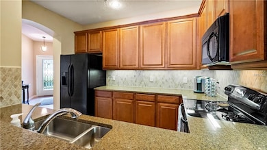 Kitchen provides plenty of storage space with 42