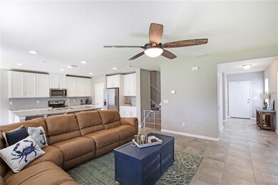 Open Floor Plan features tile throughout the first