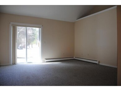 Living Room w/ Vaulted Ceiling
