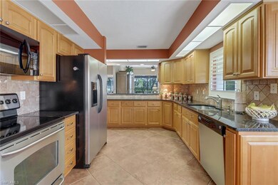 11745 Quail Village Way, Naples, FL 34119 - photo 5