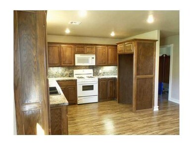Exterior Front. Gorgeous kitchen with custom Red O