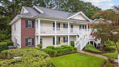 View of front of property featuring a front yard
