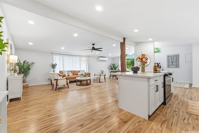 Bright, open concept living area that is surprisingly spacious and warm. One could easily imagine lots of big and small gatherings.