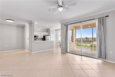 Unfurnished living room featuring ornamental moldi