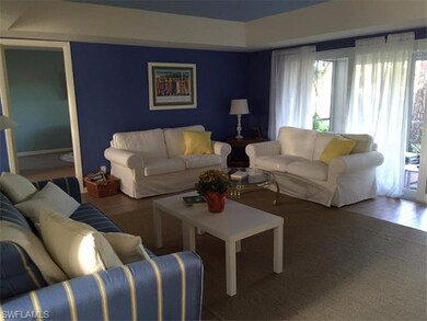 spacious living area with fresh crisp colors