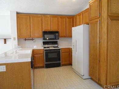 Kitchen with oak cabinets