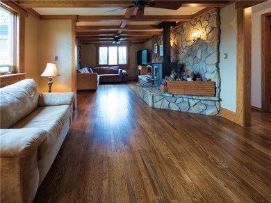 The open layout of the family room is bright and e