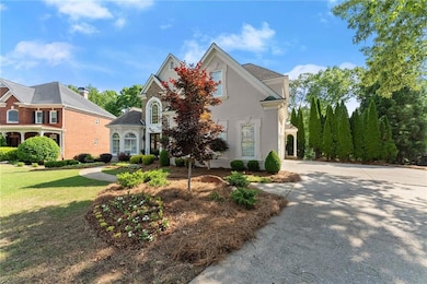 View of front of house featuring stucco siding, co