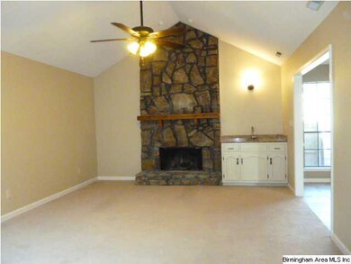 Great room with vaulted ceiling, fireplace, wet ba