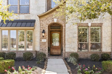 Andean Walnut Front Door with Wrought Iron insert freshly stained.
