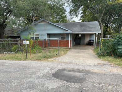 Front view and carport view with stg.