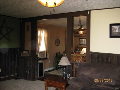 LIVING ROOM ENTRANCE TO DINNING ROOM