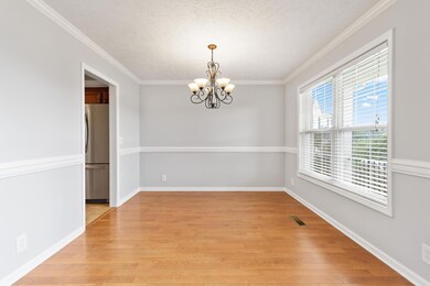 Formal dining room with lots of natural light!