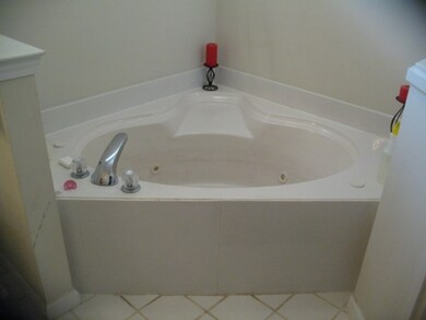 Master bath has whirlpool tub