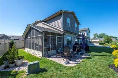 Private yard area, partially fenced for privacy