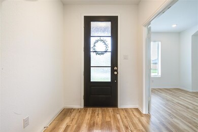 Entryway with light wood-type flooring