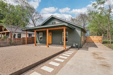 View of front of home featuring covered porch and