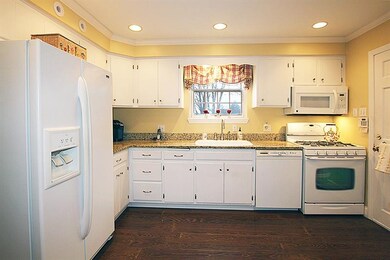 A light and bright kitchen with recessed lighting,