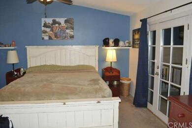 Master Bedroom with French Doors to the Private De