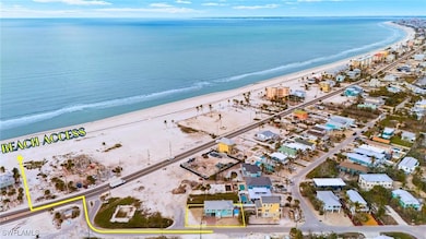 Bird's eye view featuring a beach view and a water
