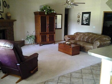 Living Room. FP/ceiling fan.