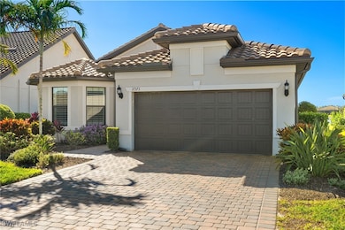 Mediterranean / spanish home featuring a garage