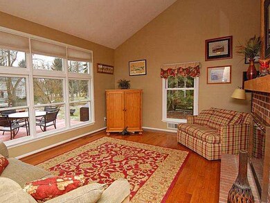 Other The family room features hardwood floors and