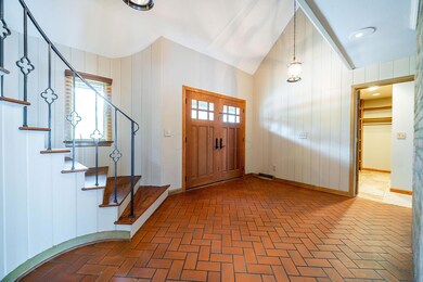 Stunning Entryway with spiral staircase