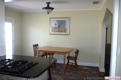 View of dining area from kitchen