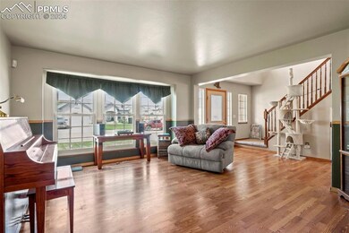 Living room featuring hardwood / wood-style floors