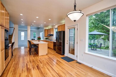 Breakfast area looking through kitchen to family r