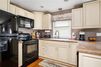 Modern white cabinets with corian countertops.