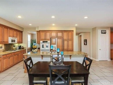 Kitchen with view of built in Refrigerator