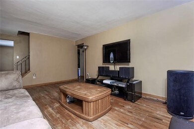 Living Room: Spacious living room with newer windo