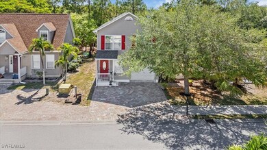 View of front of property featuring driveway