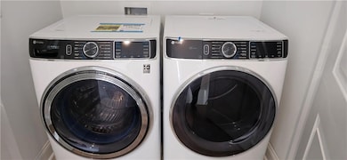Laundry area with separate washer and dryer