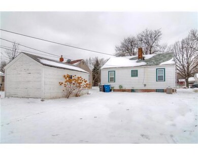 Exterior Back. Nice back yard with one car garage