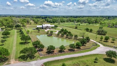 Drone / aerial view of a nearby body of water and