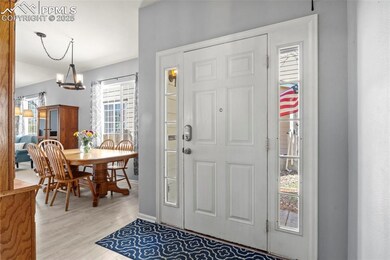 Foyer entrance featuring light wood-style floors