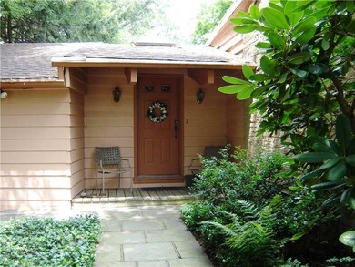 Exterior Front. A covered front door was added whe