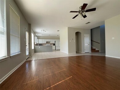 Unfurnished living room featuring light wood-type