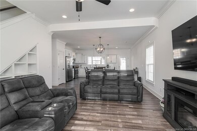 View from living room into kitchen. The open floor