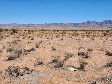 View of mountain backdrop featuring a desert lands
