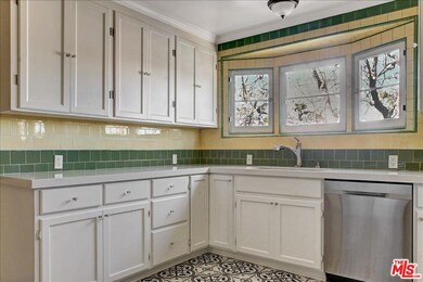 Kitchen with tile walls