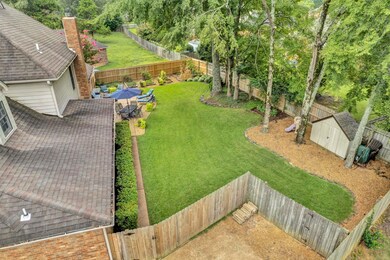 Fully fenced and featuring a storage shed. Great p