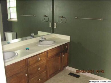 Master bath with his and hers vanities