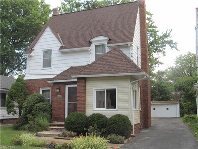 This stately colonial boasts four bedrooms, two fu
