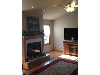 Living room with gas fireplace.