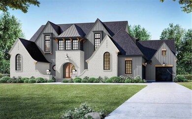 View of front of house featuring board and batten siding, a front lawn, driveway, and a garage
